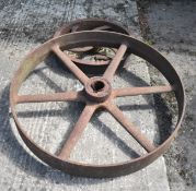 TWO CAST IRON WHEELS 42" X 6" AND 25" X 5"