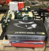 Various car parts - timing belts and chains, CV boot kits, and water pumps