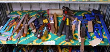 Various Hand Tools including screwdrivers, hammers, hacksaws