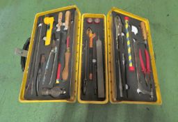 Various tools in yellow tool case