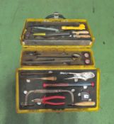 Various tools in yellow tool case