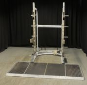 Leisurelines U1008A Olympic Performance Half Rack System with additional flooring/mats