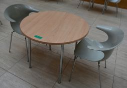 1 x round canteen table, W 900mm x H 750mm, accompanied by 2 x plastic seats