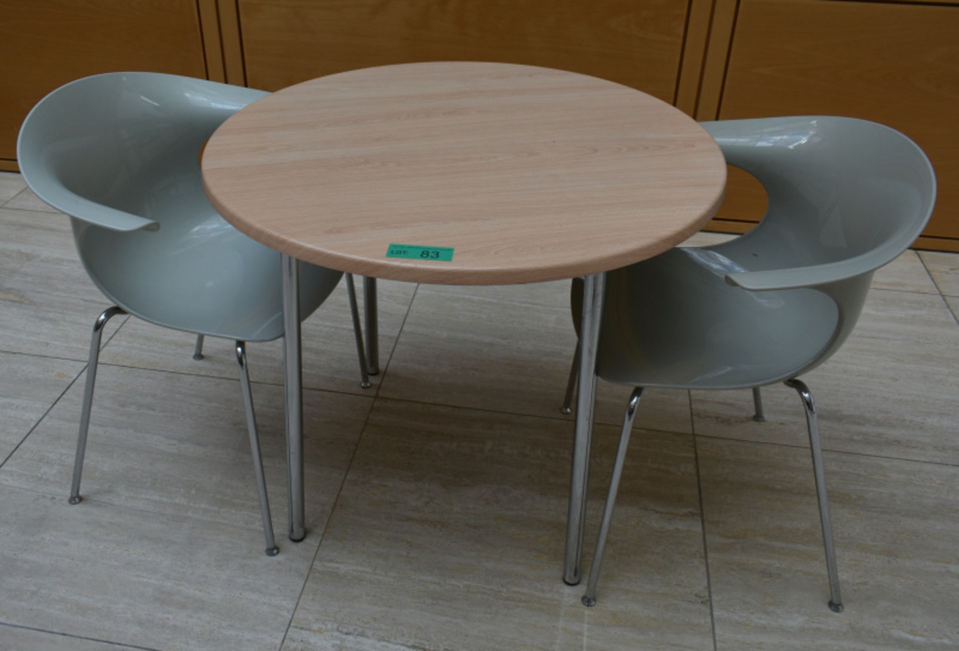 1 x round canteen table, W 900mm x H 750mm, accompanied by 2 x plastic seats