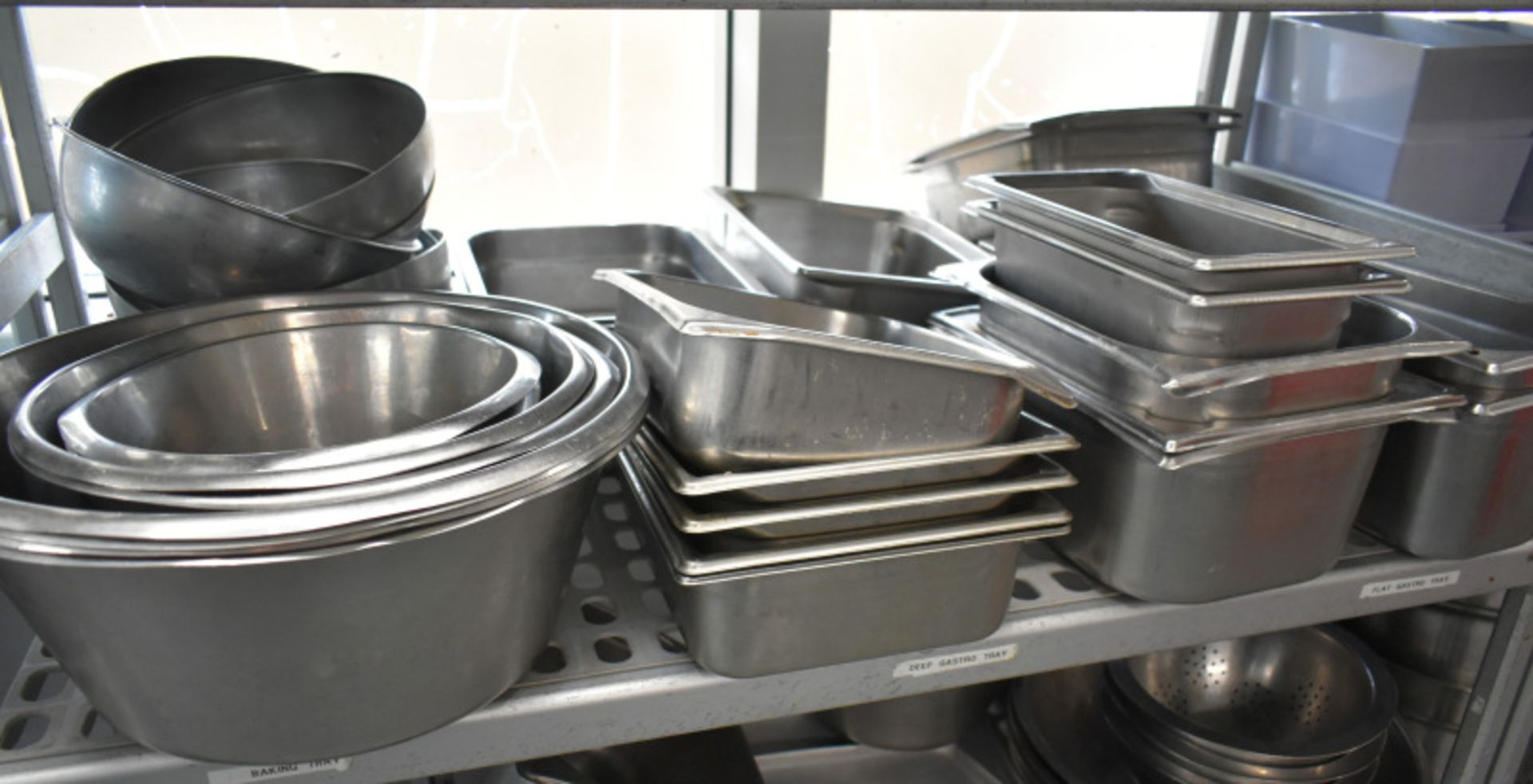 Four tier kitchen storage rack with contents, contents to include- Various stainless steel - Image 3 of 4