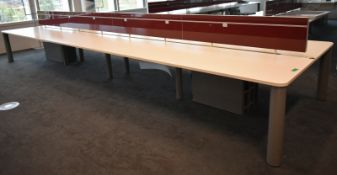 Bank of desks, seating 12, L 6500mm x W 1800mm x H 1180mm, buyer to dismantle and remove