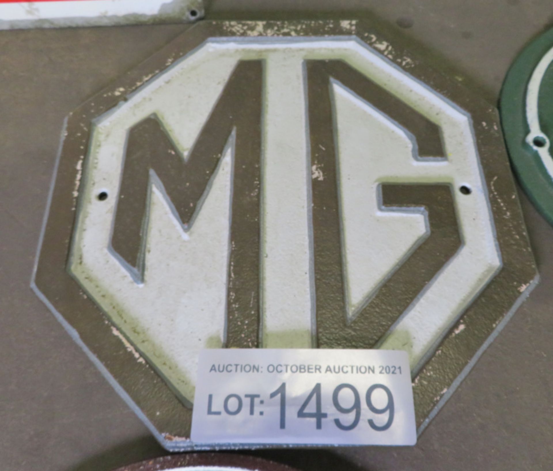 MG cast sign