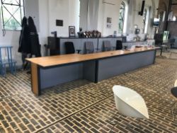 Online Auction Of Bespoke Oak Veneer Reception Desk 6.79m Long - Location: The University of Northampton - Collection Only By Appointment