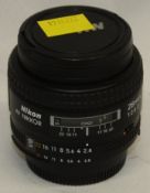 Nikon AF Nikkor 28mm 1:2.8 Lens - Serial No. - 403541 - with HOYA 52mm UV(O) Filter