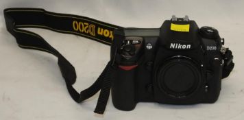 Nikon D200 camera body - serial 8025789 - no battery - no card
