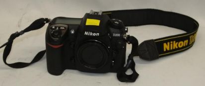 Nikon D200 camera body - serial 8024745 - no battery - no card