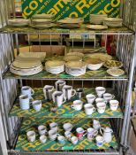 4 shelves of Various crockery - plates, cups, saucers, mugs