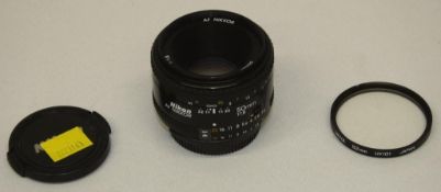 Nikon AF Nikkor 50mm - 1:1.8 Lens - Serial No. 4289701 with HOYA 52mm UV(O) Filter