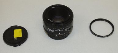 Nikon AF Nikkor 50mm - 1:1.8 Lens - Serial No. 4289700 with Nikon L37c 52mm Filter