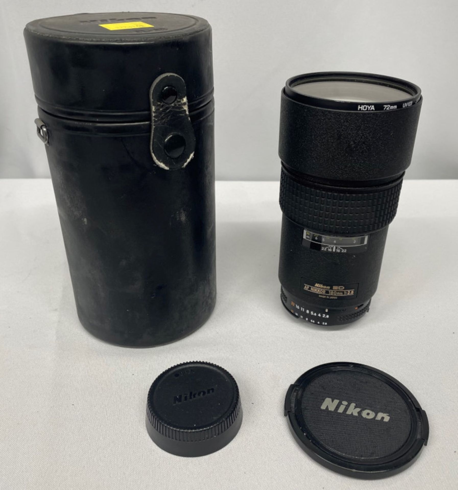 Nikon ED AF Nikkor 180mm - 1:2.8 Lens - Serial No. 272140 with HOYA 72mm UV(O) Filter in Nikon case