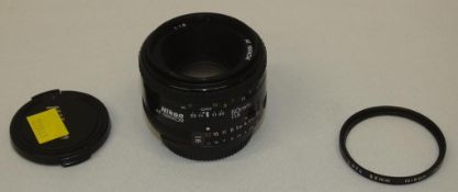 Nikon AF Nikkor 50mm - 1:1.8 Lens - Serial No. 4289702 with Nikon L37c 52mm Filter