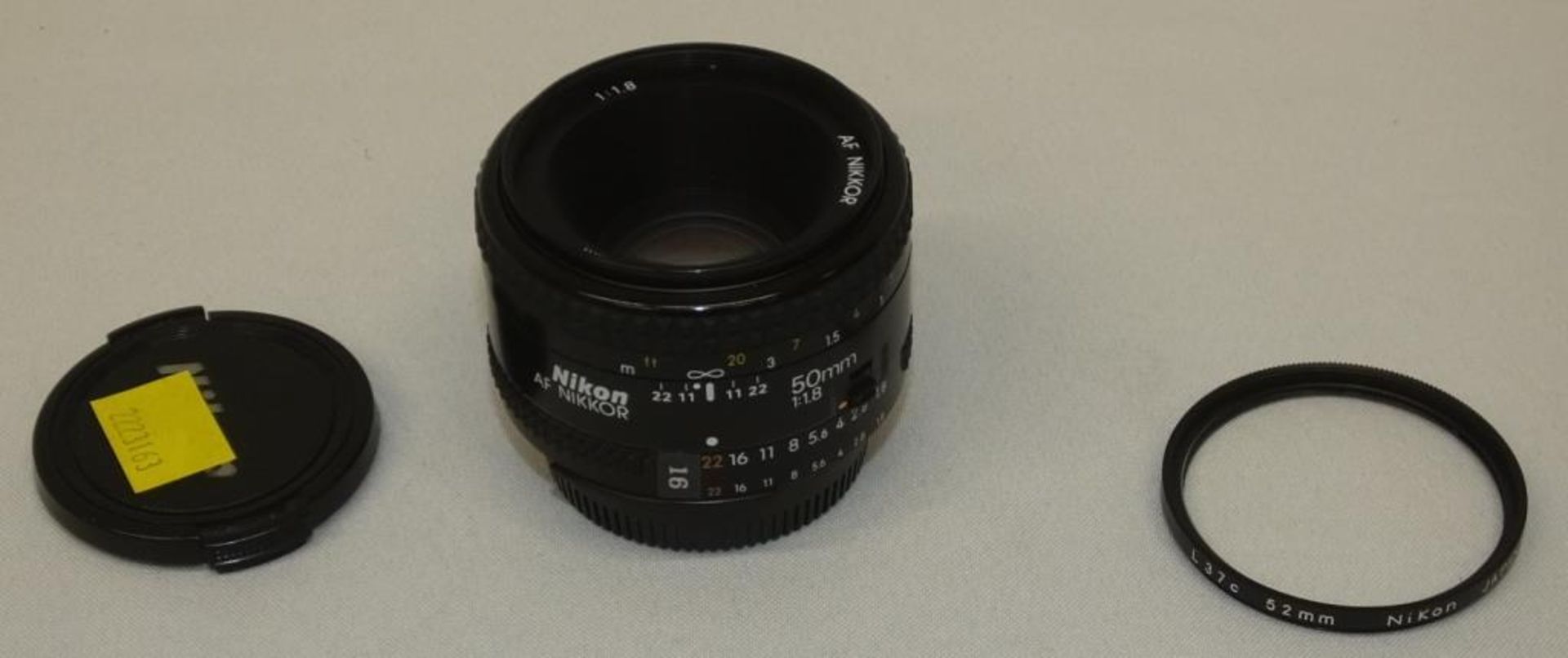 Nikon AF Nikkor 50mm - 1:1.8 Lens - Serial No. 4289702 with Nikon L37c 52mm Filter