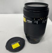 Nikon AF Nikkor 70-210mm - 1:4-5.6 Lens - Serial No. 2569312 with HOYA 62mm UV(O) Filter