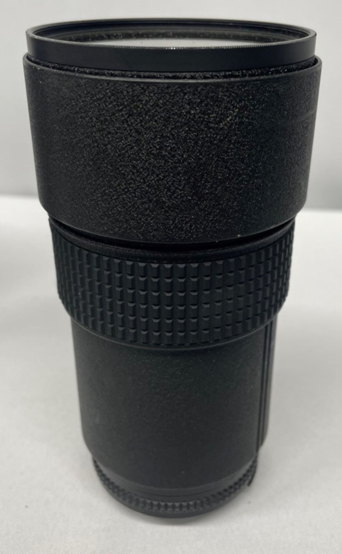 Nikon ED AF Nikkor 180mm - 1:2.8 Lens - Serial No. 272140 with HOYA 72mm UV(O) Filter in Nikon case - Image 4 of 7