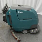 Tennant T300, comes with key, starts and runs, cleaning functionality untested- 812 hours