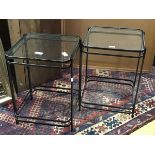 A pair of Scandinavian style anodised metal lampt tables, the square glass tops with rounded