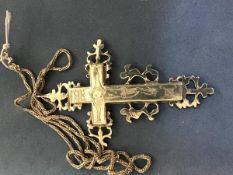 An early silver crucifix pendant on chain