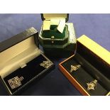 Three sets of gentleman's silver sleevelinks in presentation cases including Simon Carter of