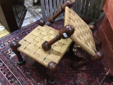 A pair of African rush topped stools on hardwood frames with turned supports (each: 32cm x 46cm x