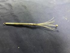 An early 20thc silver telescopic pocket swizzle stick