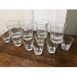 A group of four mixed whisky/gin thumb cut tumblers together with seven thumb cut shot glasses (some