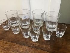 A group of four mixed whisky/gin thumb cut tumblers together with seven thumb cut shot glasses (some