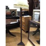 An unusual 1920's mahogany spiral twist floor lamp, on triangular stepped base (h.147cm)