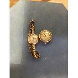 Two lady's 9ct gold wristwatches, one on metal strap