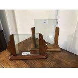 Two Art Deco photograph frames, each with two glazed panels held in open oak frames on rectangular