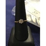 An illusion-set solitaire diamond ring (1.5g)