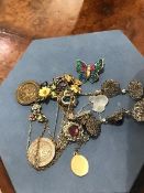 A mixed lot of costume pendants and necklaces, together with two school medals