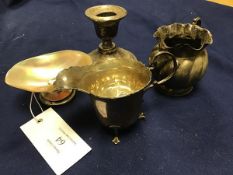 A mixed lot of silver including two silver cream jugs, a squat candlestick and a small silver