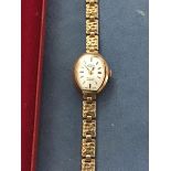 A lady's 9ct gold Rotary wristwatch and strap (14.4g)