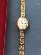 A lady's 9ct gold Rotary wristwatch and strap (14.4g)