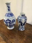 A late 19thc. blue and white Chinese exportware vase (cracks), together with an early 20thc.