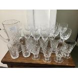 A mixed lot of Edinburgh Crystal and other glassware including eight wine glasses, a water jug,