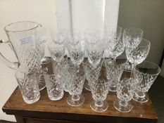 A mixed lot of Edinburgh Crystal and other glassware including eight wine glasses, a water jug,