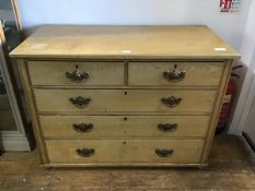 An early 20thc ash chest of drawers, the plain rectangular top above two short and three long