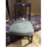 A 19thc Scottish mahogany dining chair with stuffover upholstered seat, height reduced