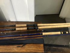 A mixed lot of fishing rods, including two Daiwa graphite Strikeforce rods and cover, a Milbro trout