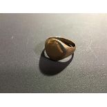 A gentleman's yellow metal signet ring marked 10k (5.3g)