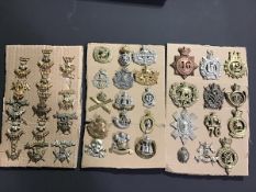 A collection of British military cap badges including Lancers, Scottish etc. (41)