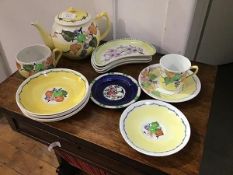 A mixed lot of Macmerry pottery including a teapot (a/f), four crescent salad plates, eight assorted
