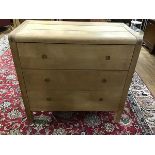 A Habitat beech chest, the plank top with curved corners, fitted three long drawers, with recessed