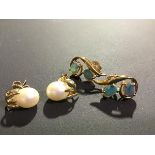 A pair of oval cultured pearl stud earrings, mounted on leaf posts; together with a pair of 9ct gold